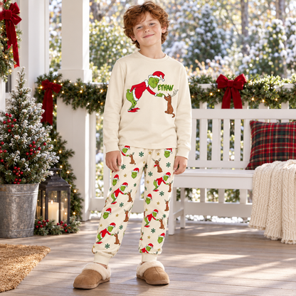 Personalized Mean Green Creature & Faithful Pup Cream Family Christmas Pajamas